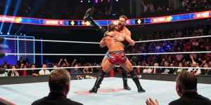LA Knight showcasing his wrestling skills in a thrilling match at a vibrant arena.